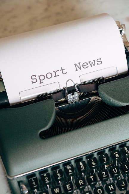 Person writing in a notebook at a cafe